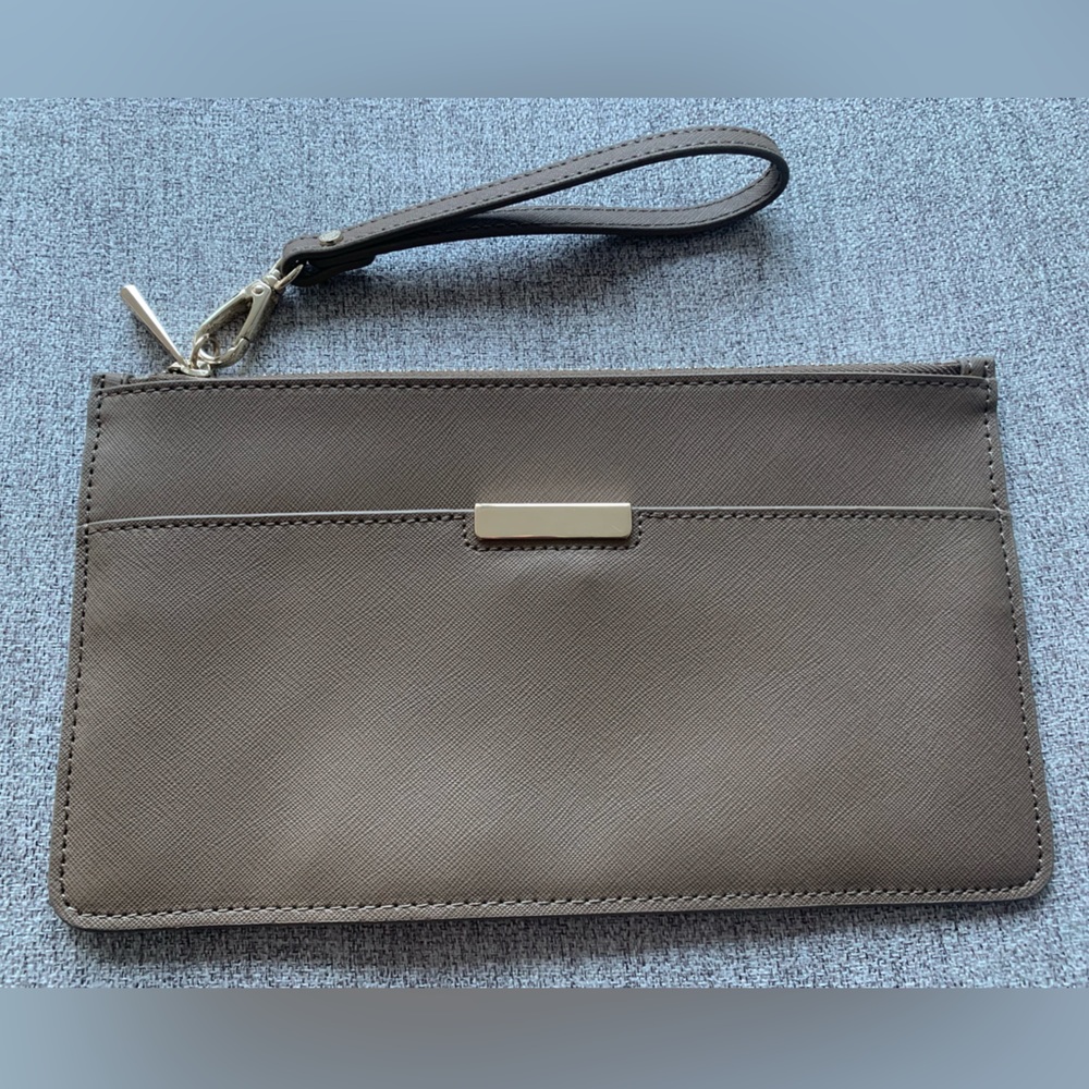 Danier leather clutch/wristlet in taupe/tan.